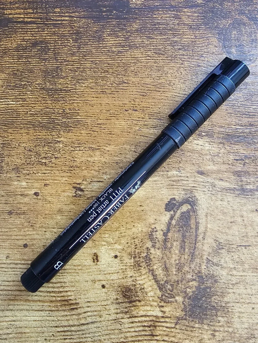 Faber-Castell Pitt Artist Pen with a brush tip in black India ink
